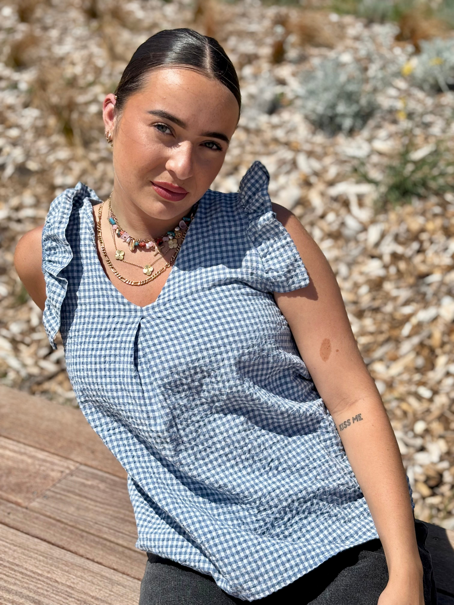 Top à volants en coton et nylon bleu jean