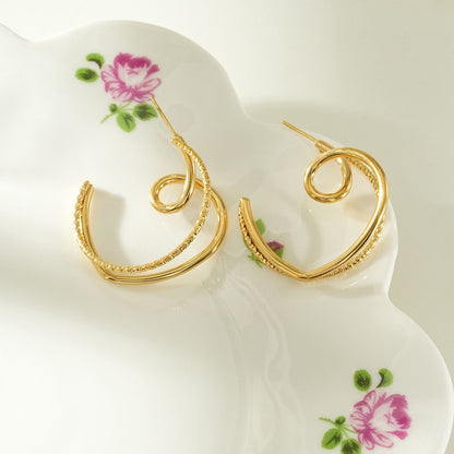 Boucles Torsadées Dorées
