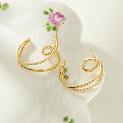 Boucles Torsadées Dorées