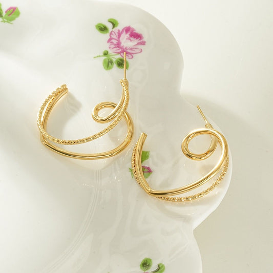 Boucles Torsadées Dorées