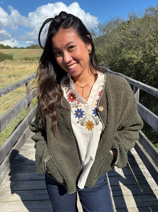 Veste en maille bouclette chic et cosy 
