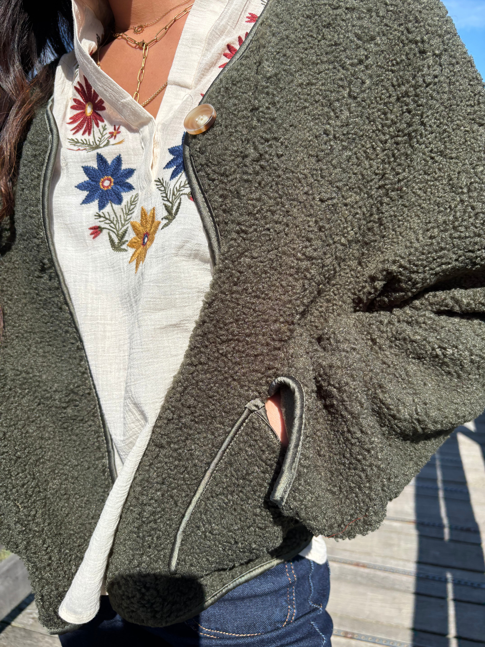 Veste en maille bouclette chic et cosy 
